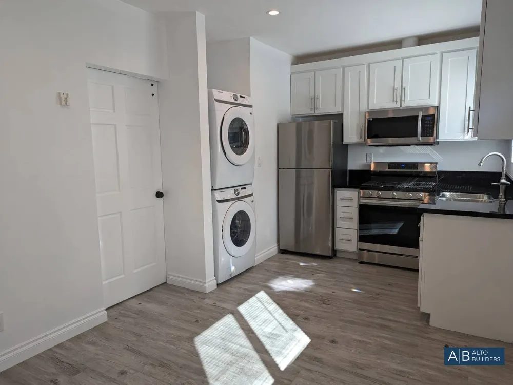 Sherman Oaks Compact ADU Conversion – Bathroom with Marble-Look Tile